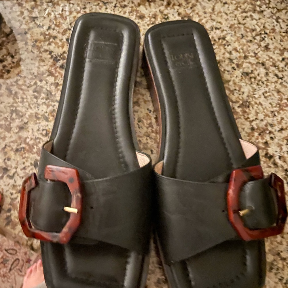 Slip on leather and wood slides.